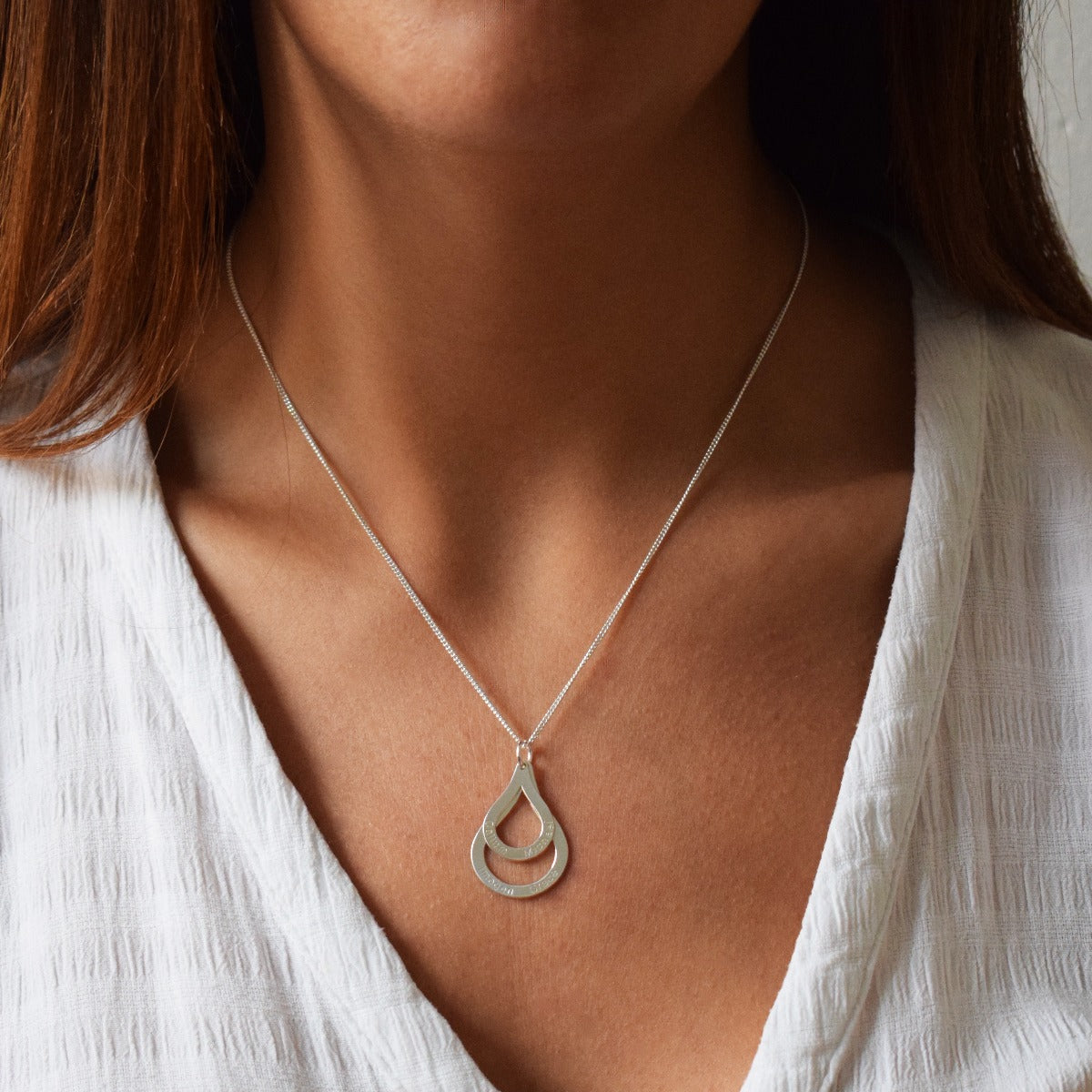 Double Tear Drop Pendant On Lady