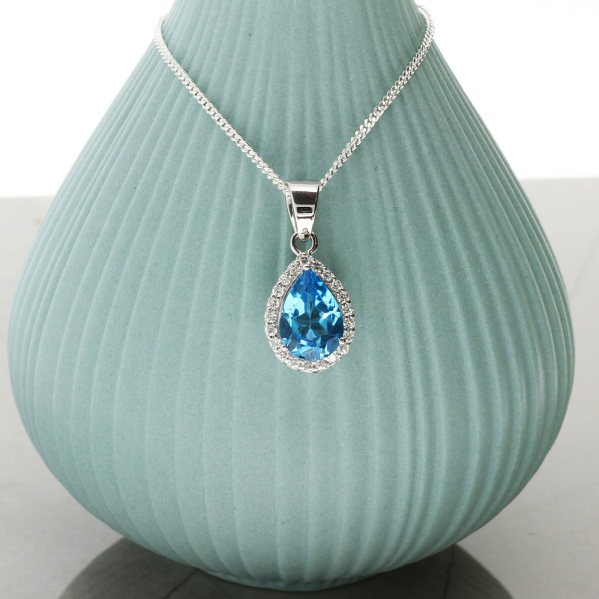 Teardrop Blue Topaz Pendant Set In 9ct White Gold & Diamonds With Optional Chain