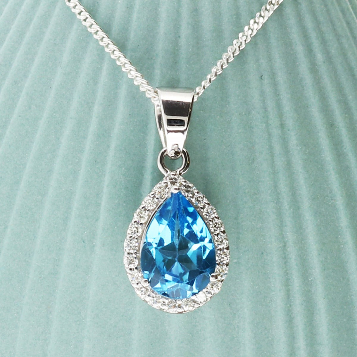 Teardrop Blue Topaz Pendant Set In 9ct White Gold & Diamonds With Optional Chain