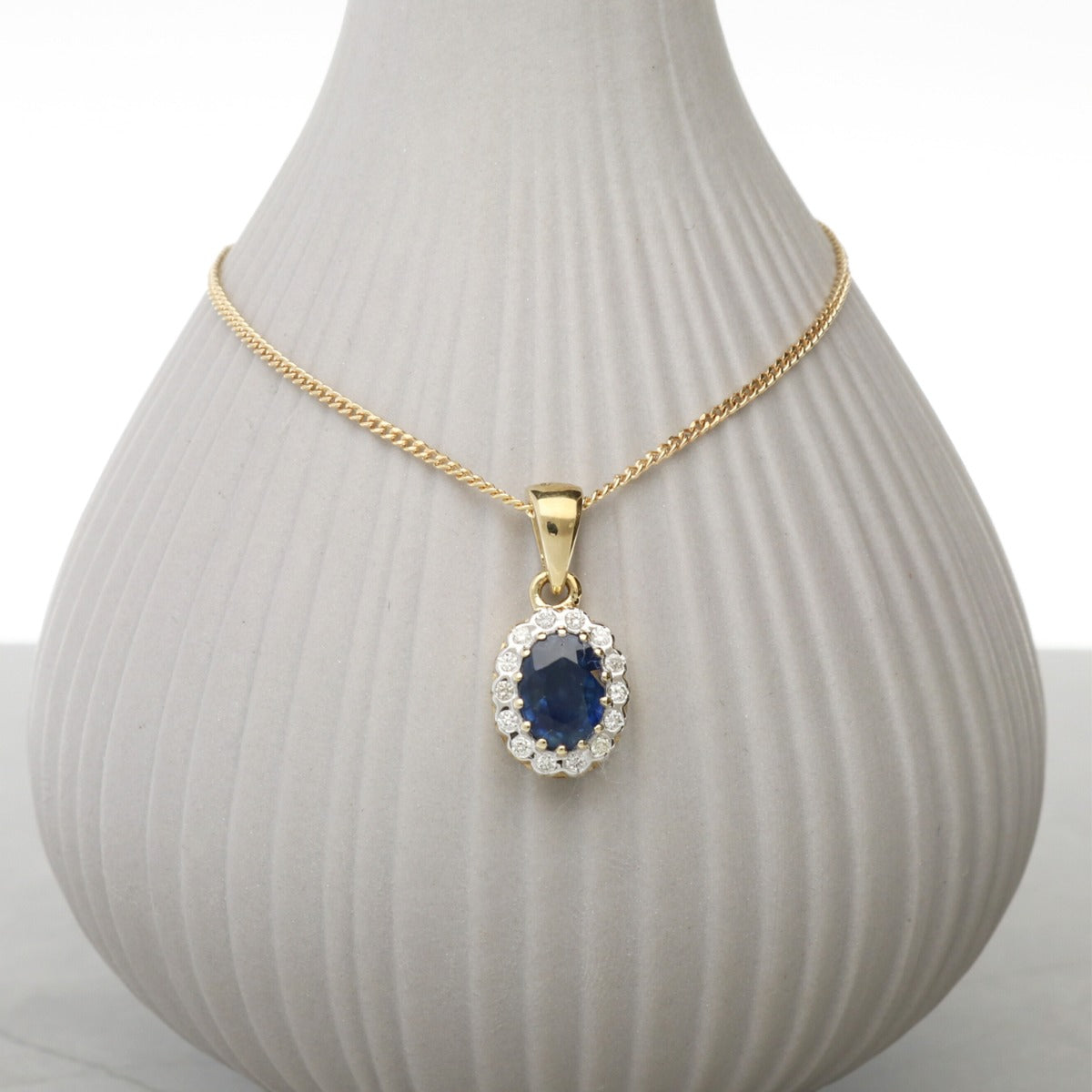 9ct Yellow Gold & Diamond Cluster Set Oval Sapphire Pendant With Optional Chain