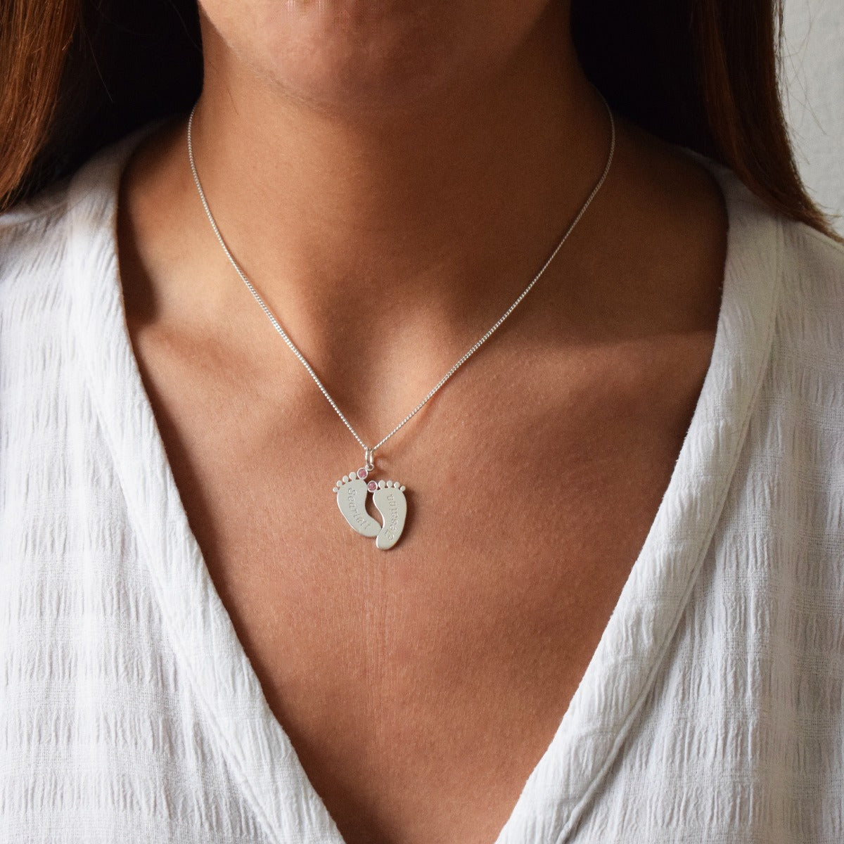 Engraved Footprints Pendant On Lady