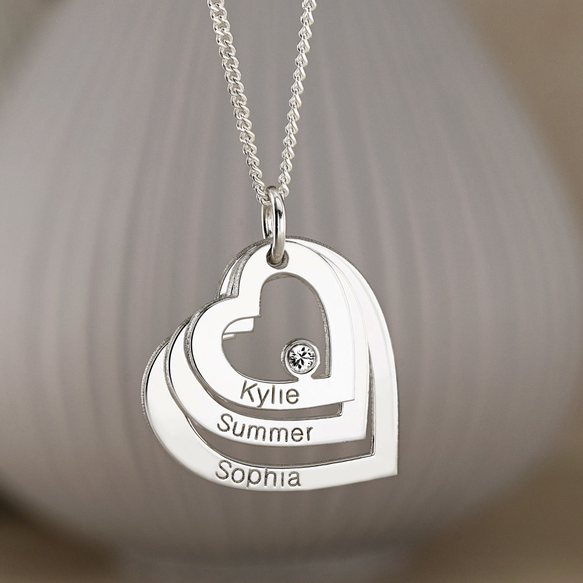 Sterling Silver Engraved Triple Heart Pendant With Crystal